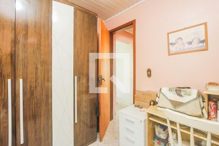 Quarto 2 de casa à venda com 2 quartos, 60m² em Passo da Areia, Porto Alegre