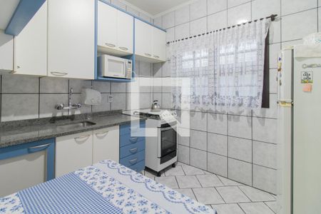 Cozinha de casa de condomínio à venda com 3 quartos, 118m² em Vila Nova, Porto Alegre