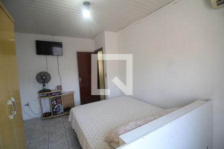 Quarto 1 de casa à venda com 3 quartos, 130m² em Guajuviras, Canoas