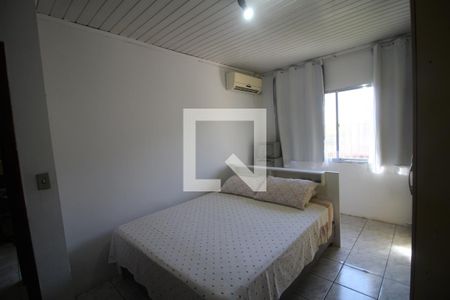 Quarto 1 de casa à venda com 3 quartos, 130m² em Guajuviras, Canoas