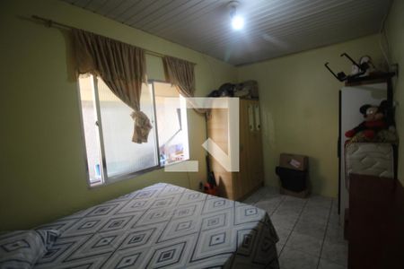 Quarto 2 de casa à venda com 3 quartos, 130m² em Guajuviras, Canoas