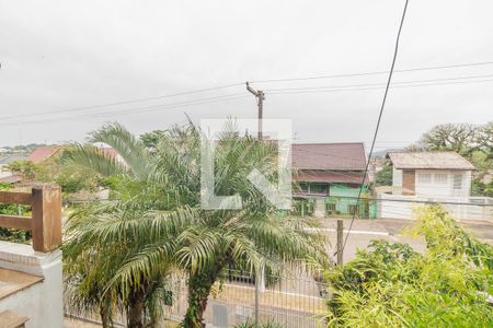 Vista de casa à venda com 4 quartos, 350m² em Campo Novo, Porto Alegre