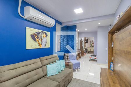 Sala de casa de condomínio à venda com 2 quartos, 60m² em Olaria, Canoas