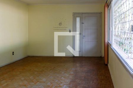 Sala de estar de casa à venda com 6 quartos, 360m² em Três Figueiras, Porto Alegre