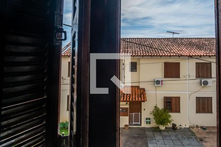 Vista de casa de condomínio à venda com 2 quartos, 73m² em Vila Nova, Porto Alegre