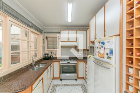 Cozinha e Área de Serviço de casa de condomínio para alugar com 4 quartos, 344m² em Ipanema, Porto Alegre