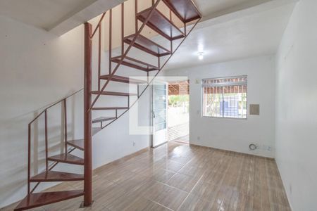 Sala de casa de condomínio para alugar com 2 quartos, 72m² em Rio Branco, Canoas