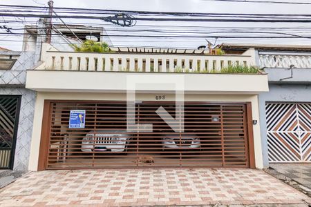 Casa à venda com 190m², 5 quartos e 3 vagas Casa à venda com 190m², 5 quartos e 3 vagasFachada