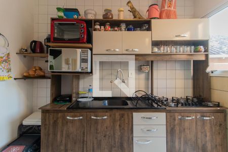 Cozinha e Área de Serviço de casa à venda com 2 quartos, 98m² em Vila Nova, Porto Alegre