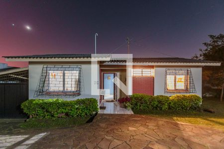 Fachada de casa de condomínio à venda com 3 quartos, 100m² em Santa Tereza, Porto Alegre