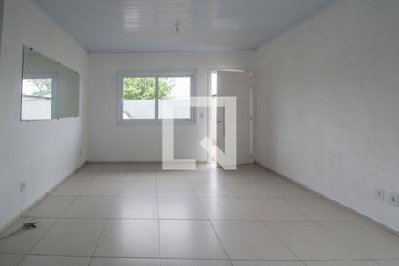 Sala de casa de condomínio para alugar com 2 quartos, 55m² em Niterói, Canoas