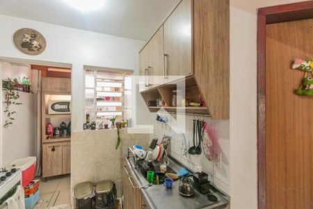 Cozinha de casa de condomínio à venda com 2 quartos, 65m² em Campo Novo, Porto Alegre