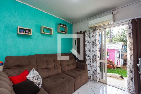 Sala  de casa à venda com 3 quartos, 66m² em Harmonia, Canoas