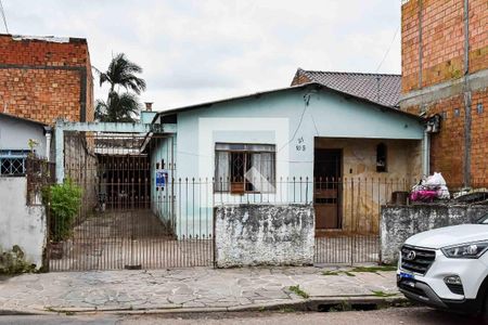 Casa à venda com 100m², 4 quartos e 2 vagas Casa à venda com 100m², 4 quartos e 2 vagasFachada
