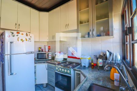 Casa à venda com 378m², 4 quartos e 2 vagas Casa à venda com 378m², 4 quartos e 2 vagasCozinha e Área de Serviço