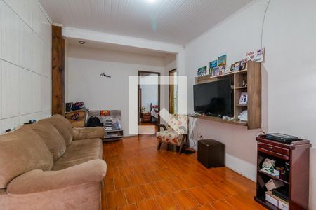 Sala de casa à venda com 4 quartos, 337m² em Vila Nova, Porto Alegre