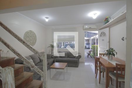 Sala de casa de condomínio à venda com 3 quartos, 110m² em Marechal Rondon, Canoas