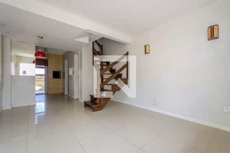 Sala de casa de condomínio à venda com 2 quartos, 63m² em Vila Nova, Porto Alegre