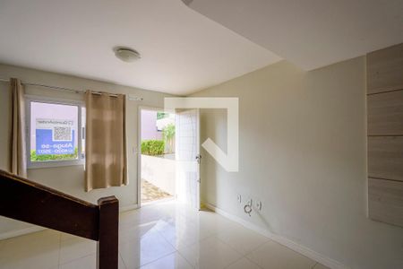 Sala de casa de condomínio à venda com 2 quartos, 63m² em Vila Nova, Porto Alegre