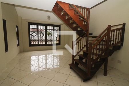 Sala de Estar de casa de condomínio à venda com 3 quartos, 190m² em Nonoai, Porto Alegre