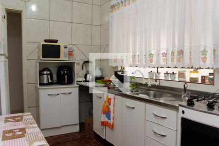 Casa à venda com 149m², 4 quartos e 3 vagas Casa à venda com 149m², 4 quartos e 3 vagasCozinha