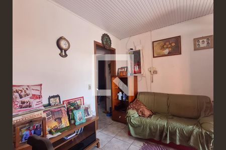 Sala de casa à venda com 4 quartos, 129m² em Sarandi, Porto Alegre