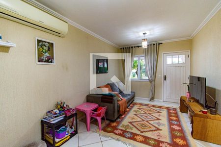 Sala de casa de condomínio à venda com 3 quartos, 74m² em Estância Velha, Canoas
