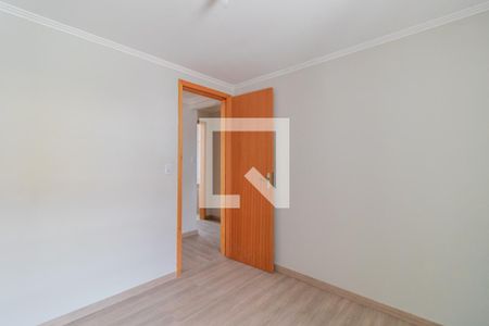 Quarto 2 de casa à venda com 3 quartos, 101m² em Guarujá, Porto Alegre