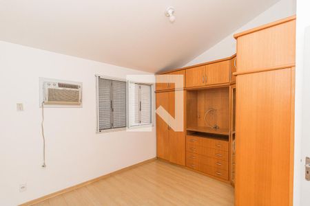 Quarto 1 de casa de condomínio para alugar com 3 quartos, 80m² em Humaitá, Porto Alegre