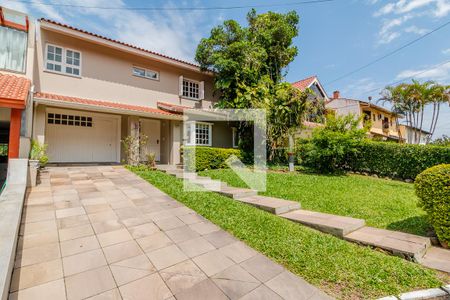 Casa de condomínio à venda com 290m², 4 quartos e 3 vagas Casa de condomínio à venda com 290m², 4 quartos e 3 vagasFachada da casa