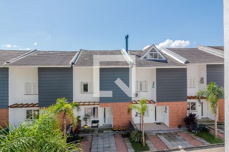 Vista de casa de condomínio à venda com 3 quartos, 240m² em Vila Nova, Porto Alegre