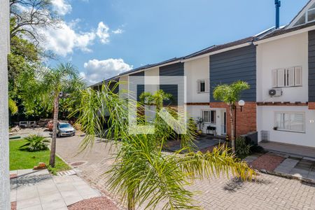 Vista de casa de condomínio à venda com 3 quartos, 240m² em Vila Nova, Porto Alegre