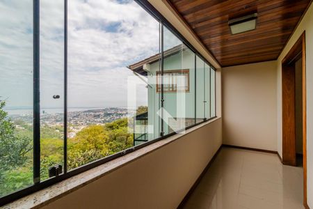 Sala - varanda de casa à venda com 3 quartos, 330m² em Teresópolis, Porto Alegre