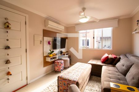 Sala de casa de condomínio à venda com 3 quartos, 86m² em Jardim Itu, Porto Alegre