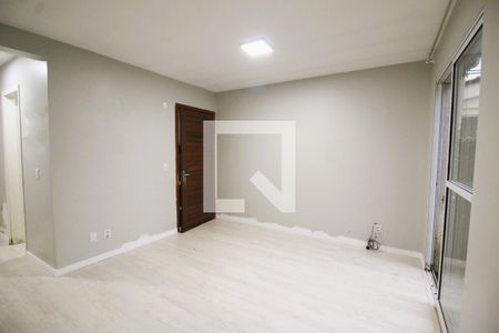 Sala de casa de condomínio à venda com 2 quartos, 54m² em Olaria, Canoas