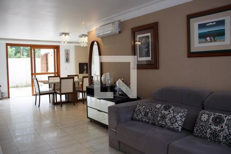 Sala de casa de condomínio à venda com 4 quartos, 334m² em Pedra Redonda, Porto Alegre