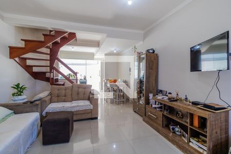 Sala de casa de condomínio à venda com 2 quartos, 102m² em Guarujá, Porto Alegre