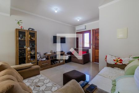 Sala de casa de condomínio à venda com 2 quartos, 102m² em Guarujá, Porto Alegre