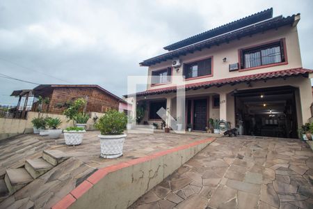 Casa à venda com 238m², 4 quartos e 2 vagas Casa à venda com 238m², 4 quartos e 2 vagasFachada