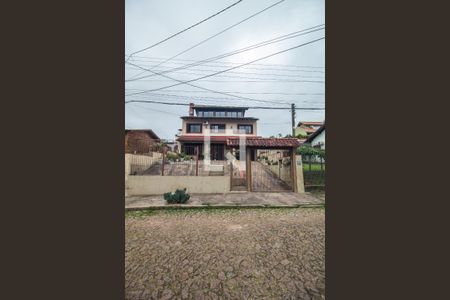 Casa à venda com 238m², 4 quartos e 2 vagas Casa à venda com 238m², 4 quartos e 2 vagasFachada