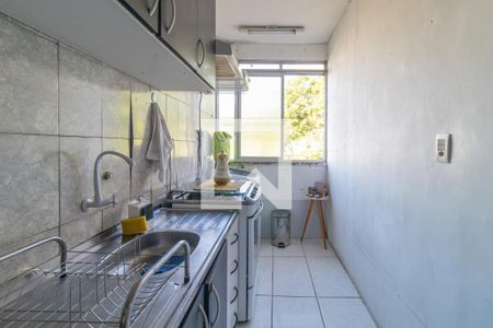 Cozinha e Área de Serviço de apartamento à venda com 2 quartos, 60m² em Vila Nova, Porto Alegre