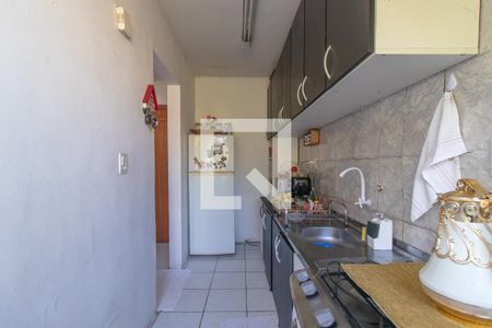 Cozinha e Área de Serviço de apartamento à venda com 2 quartos, 60m² em Vila Nova, Porto Alegre