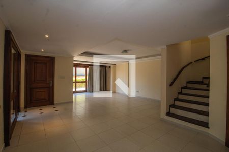 Sala de casa de condomínio à venda com 3 quartos, 256m² em Vila Assunção, Porto Alegre