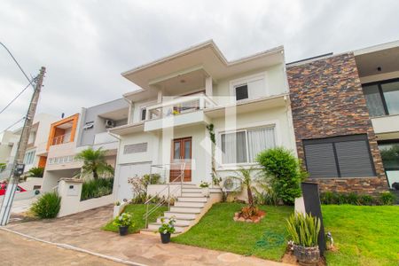 Casa de condomínio à venda com 270m², 5 quartos e 2 vagas Casa de condomínio à venda com 270m², 5 quartos e 2 vagasFachada