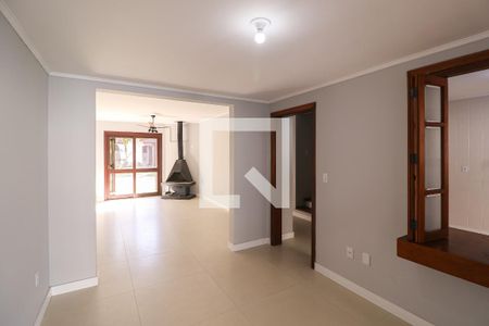 Sala de casa de condomínio à venda com 3 quartos, 130m² em Cavalhada, Porto Alegre