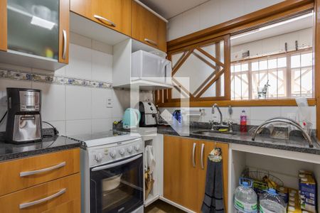 Cozinha de casa de condomínio à venda com 3 quartos, 170m² em Sarandi, Porto Alegre