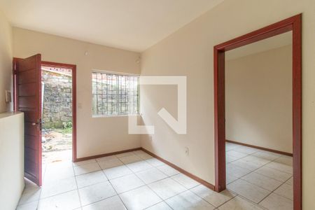 Sala de casa de condomínio para alugar com 1 quarto, 42m² em Vila Nova, Porto Alegre