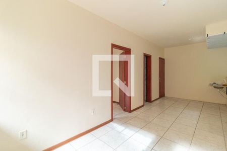 Sala de casa de condomínio para alugar com 1 quarto, 42m² em Vila Nova, Porto Alegre