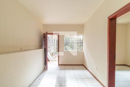 Sala de casa de condomínio para alugar com 1 quarto, 42m² em Vila Nova, Porto Alegre