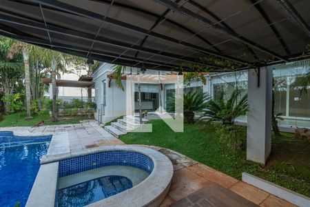 Casa de condomínio à venda com 490m², 4 quartos e 4 vagas Casa de condomínio à venda com 490m², 4 quartos e 4 vagasPiscina